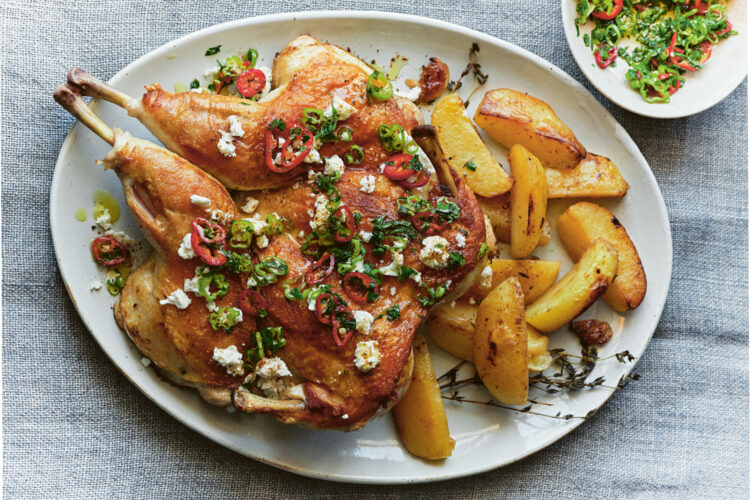 Feta-brined spatchcock chicken is cooked under a weight  in this Egyptian recipe